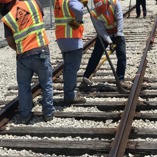 Men Working on a Rail Track